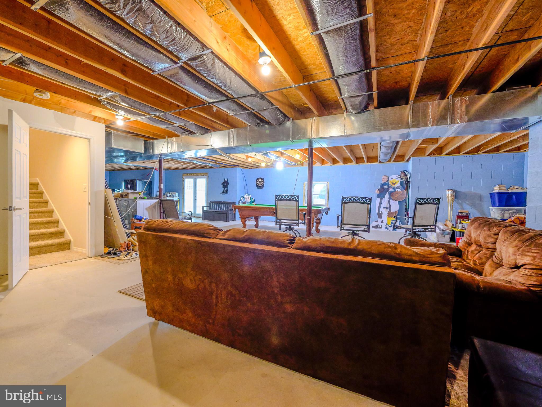 559 Franklinville Road Mullica Hill, NJ 08062 - Photo 27 of 41 a dining room with furniture and a kitchen view