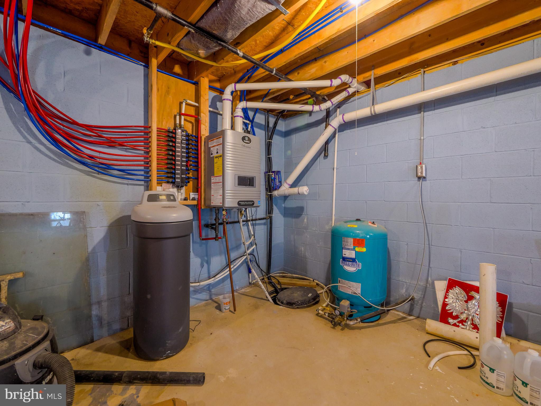 559 Franklinville Road Mullica Hill, NJ 08062 - Photo 31 of 41 a storage room with furniture and a fan