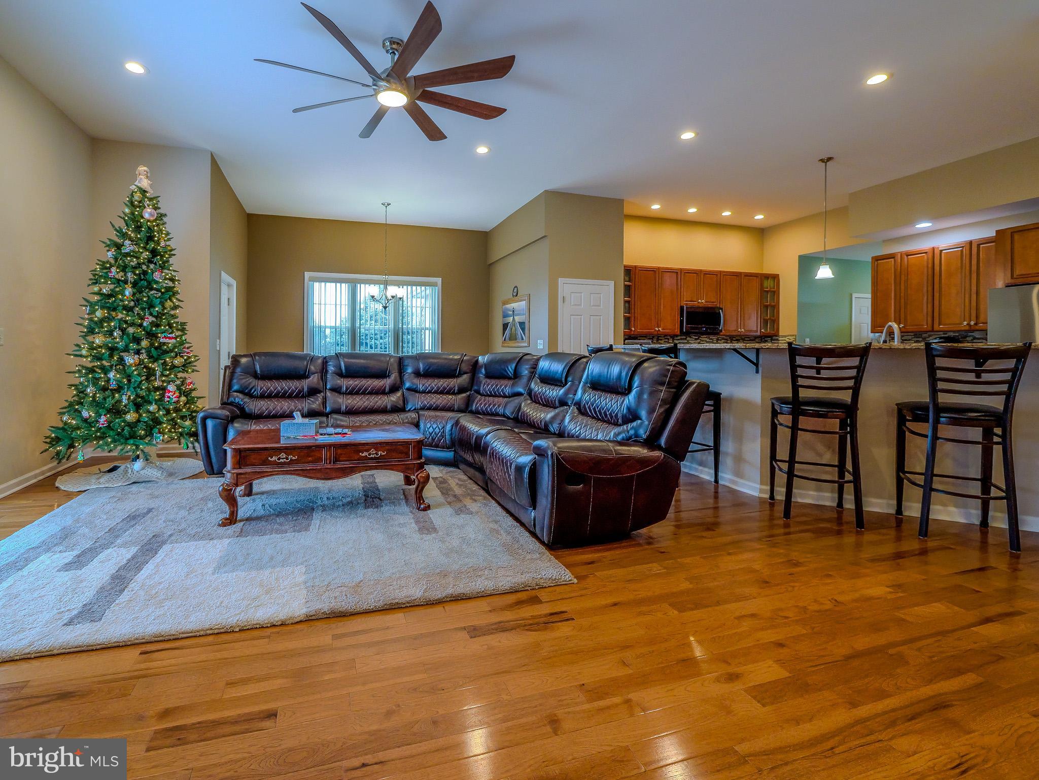 559 Franklinville Road Mullica Hill, NJ 08062 - Photo 4 of 41 a living room with lots of furniture and a potted plant