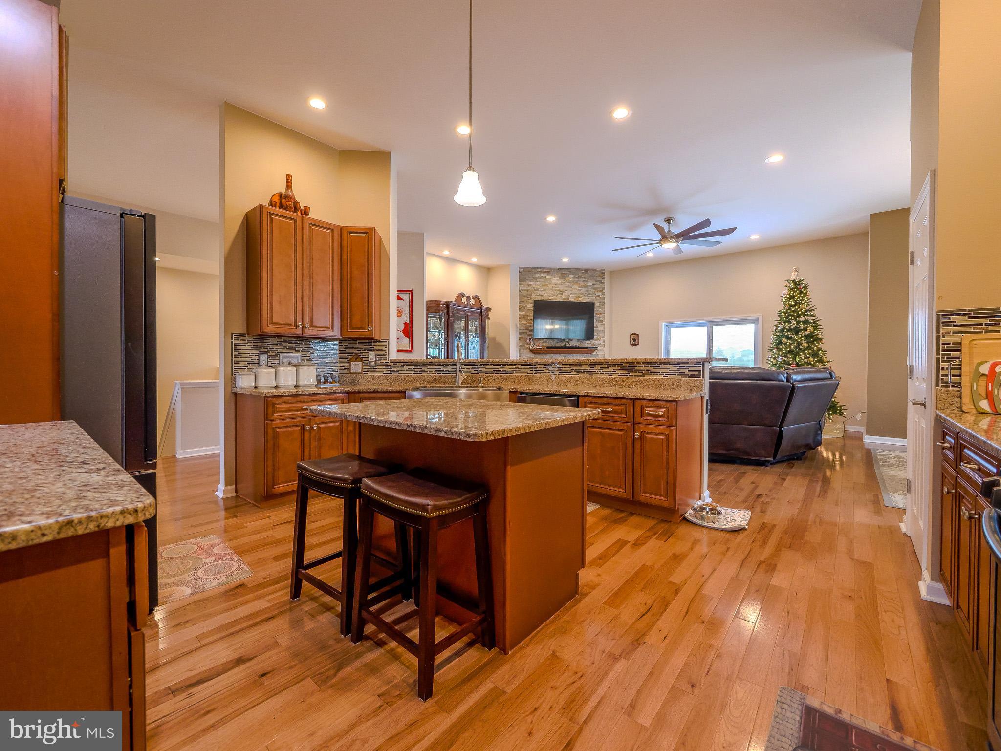 559 Franklinville Road Mullica Hill, NJ 08062 - Photo 6 of 41 a kitchen with stainless steel appliances granite countertop counter top space a refrigerator and cabinets