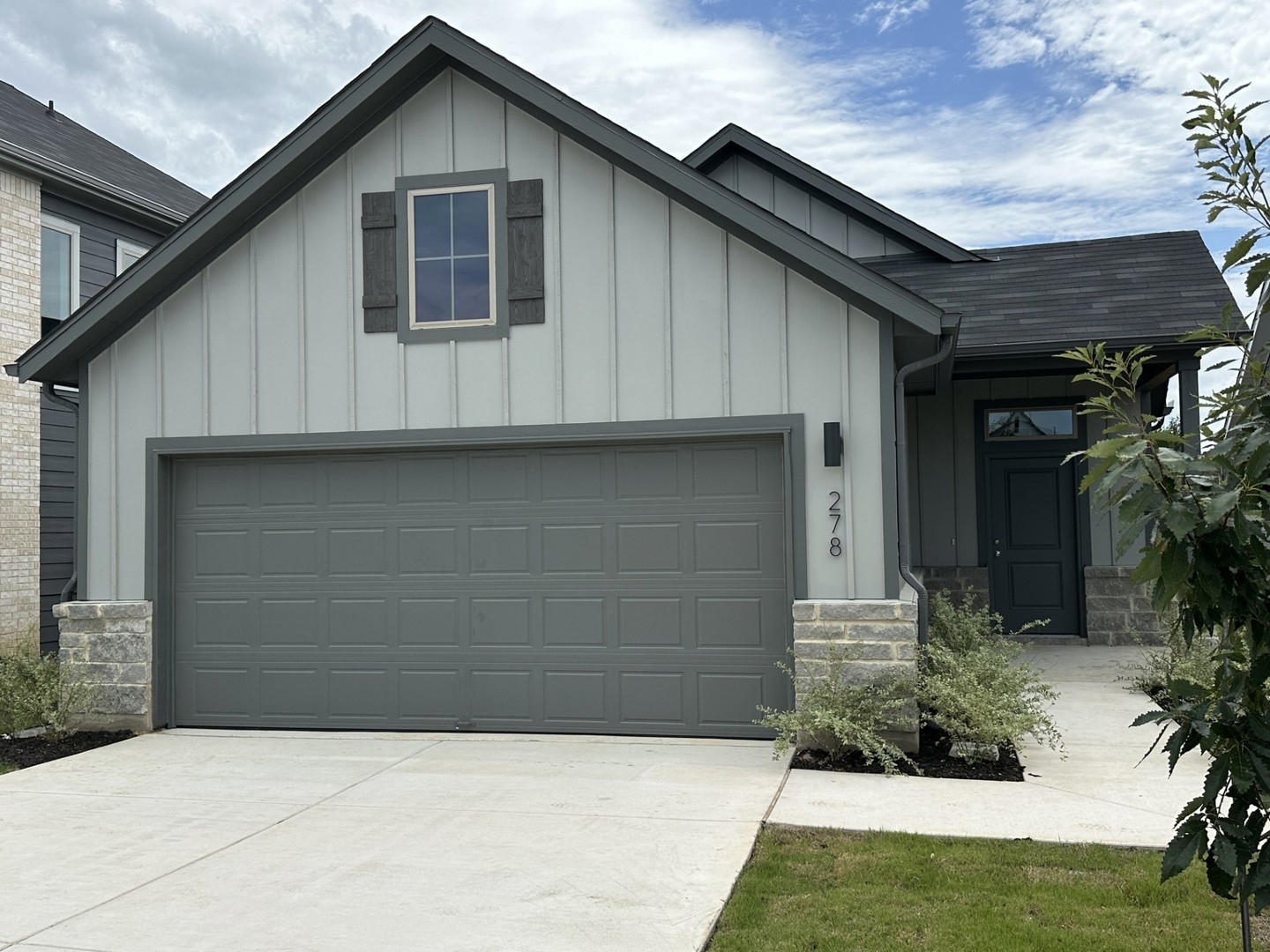 a front view of house with yard