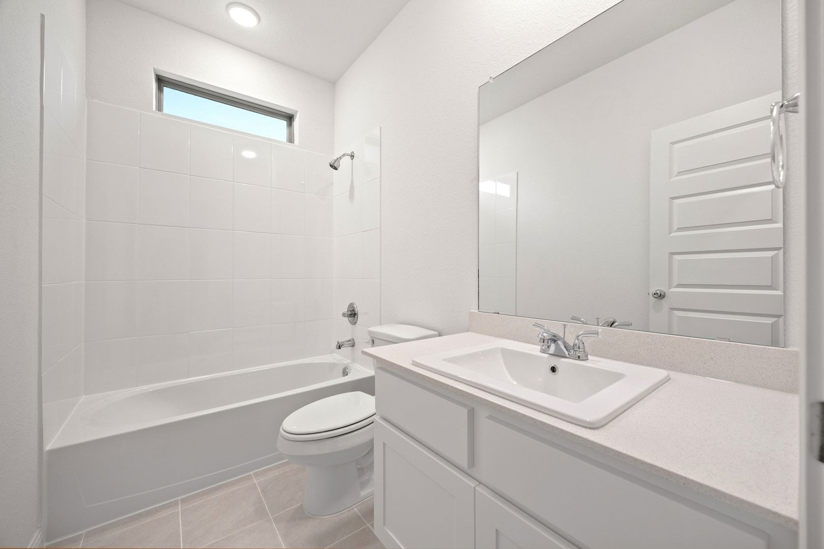 278 Bendecido Loop Elgin, TX 78621 - Photo 21 of 37 a bathroom with a sink a toilet and shower