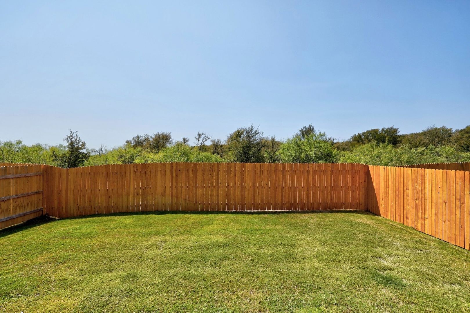 278 Bendecido Loop Elgin, TX 78621 - Photo 25 of 37 a view of deck and wooden fence