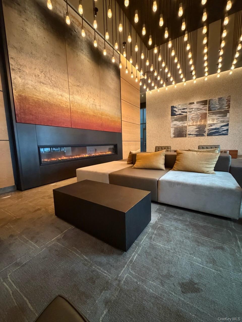 10 West End Avenue, Unit 20B Manhattan, NY 10023 - Photo 32 of 41 Building lobby featuring a towering ceiling