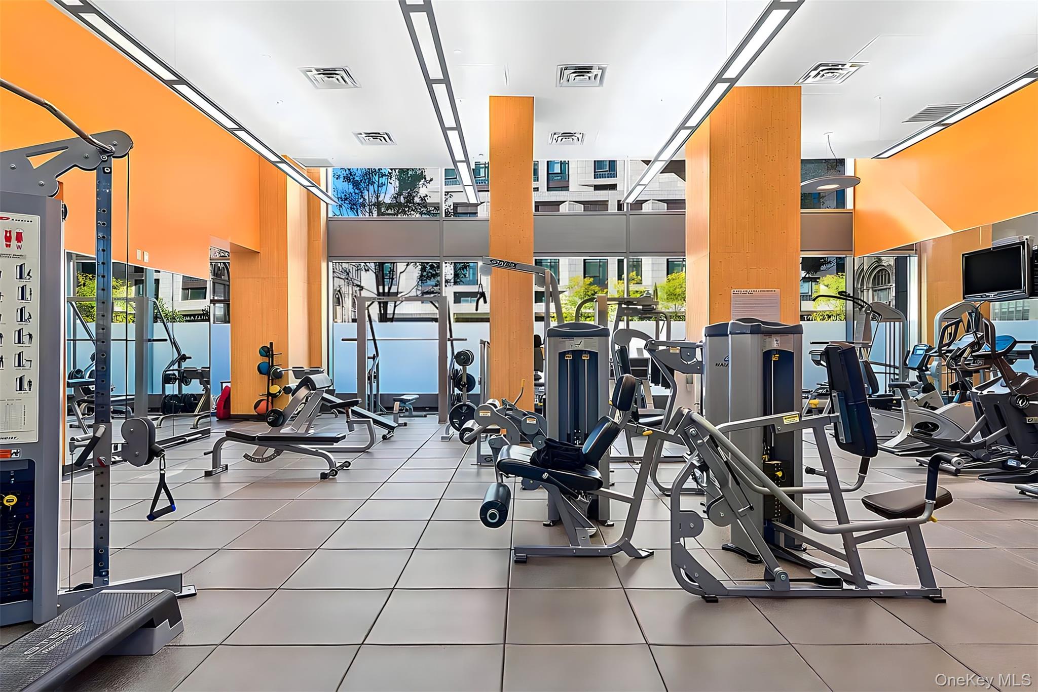 10 West End Avenue, Unit 20B Manhattan, NY 10023 - Photo 35 of 41 Exercise room with a high ceiling