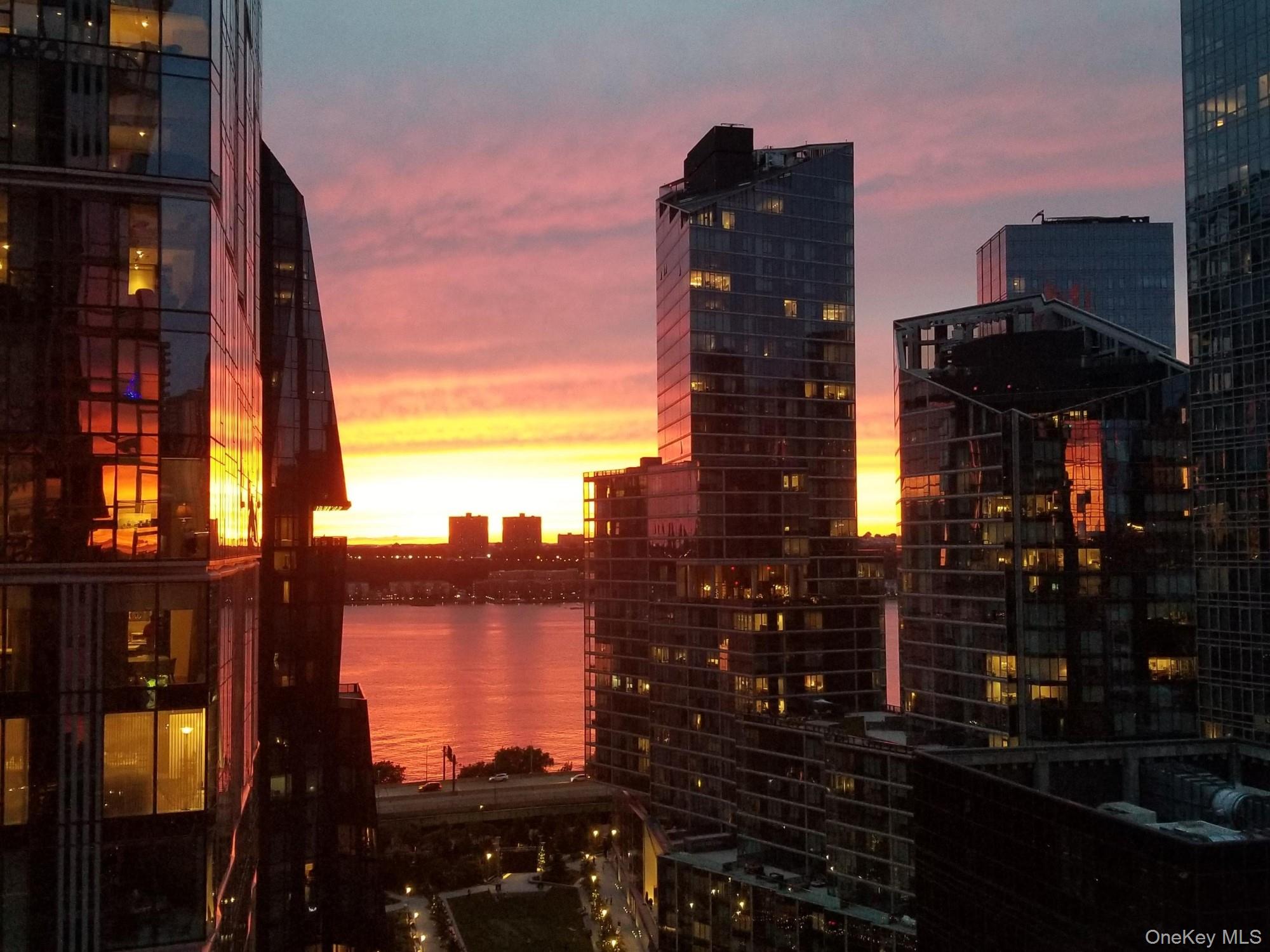 10 West End Avenue, Unit 20B Manhattan, NY 10023 - Photo 39 of 41 City view with a large body of water