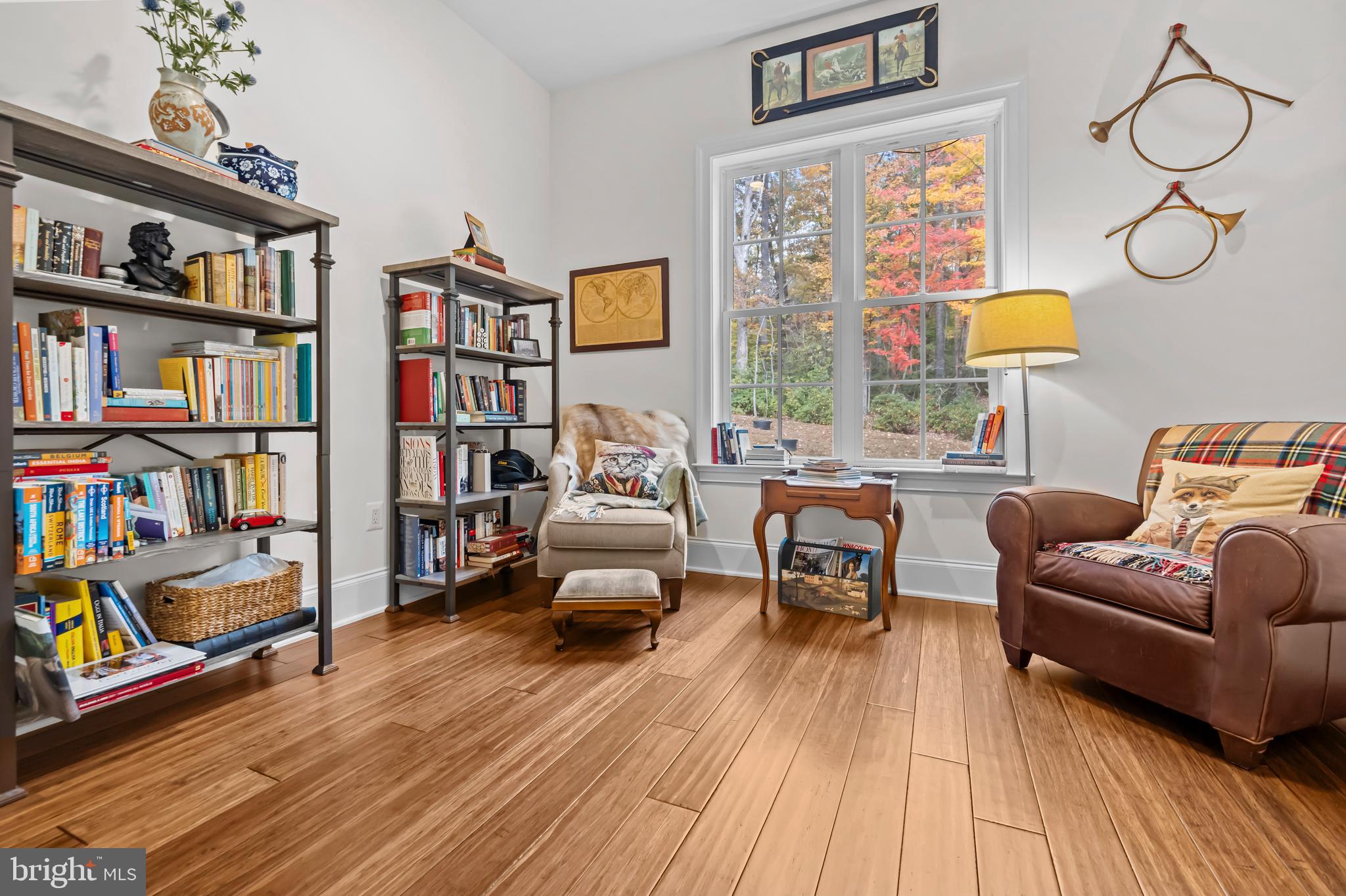 13025 Yates Ford Road Clifton, VA 20124 - Photo 22 of 82 a living room with furniture and a book shelf