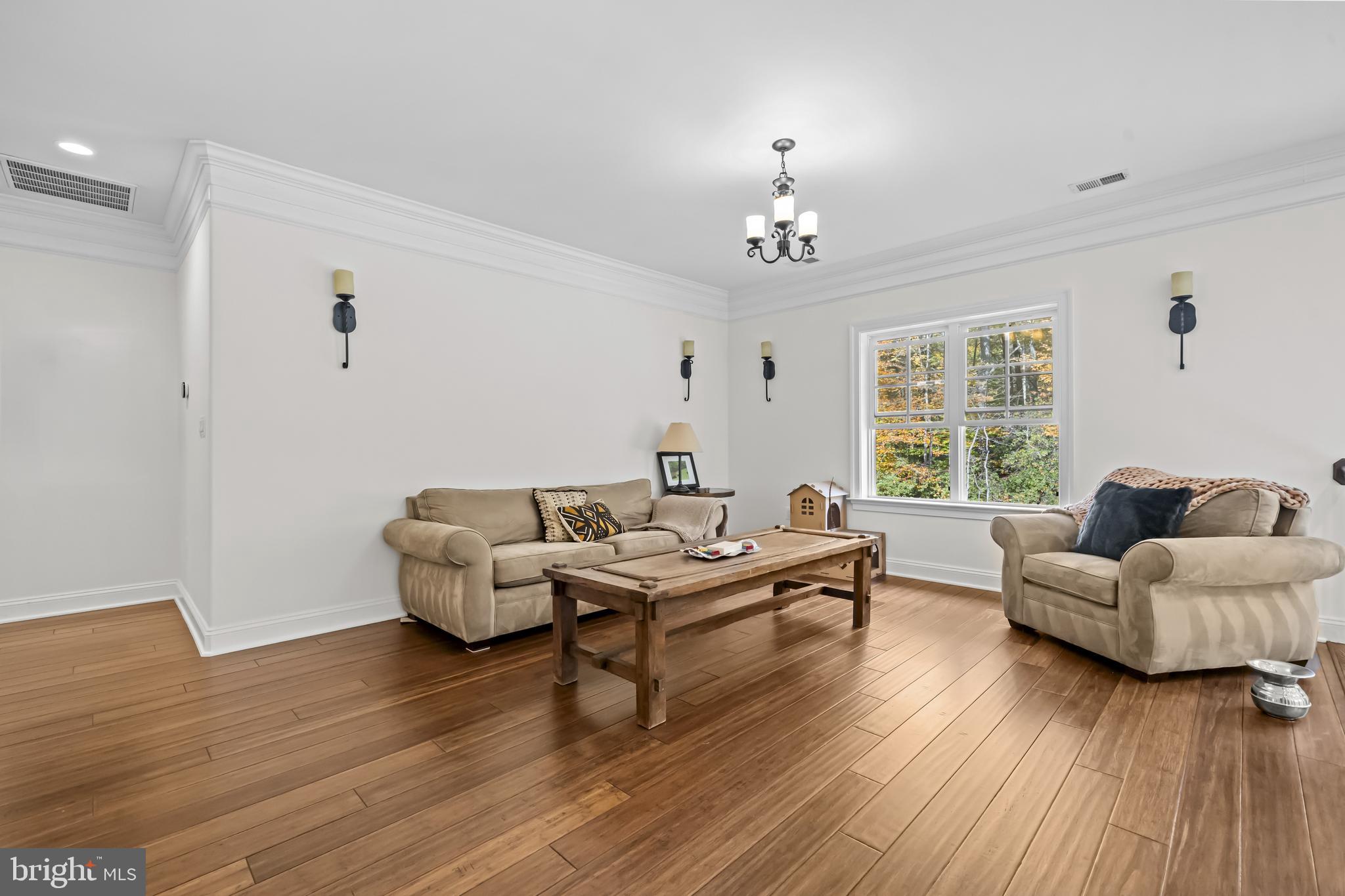 13025 Yates Ford Road Clifton, VA 20124 - Photo 30 of 82 a living room with furniture and a large window