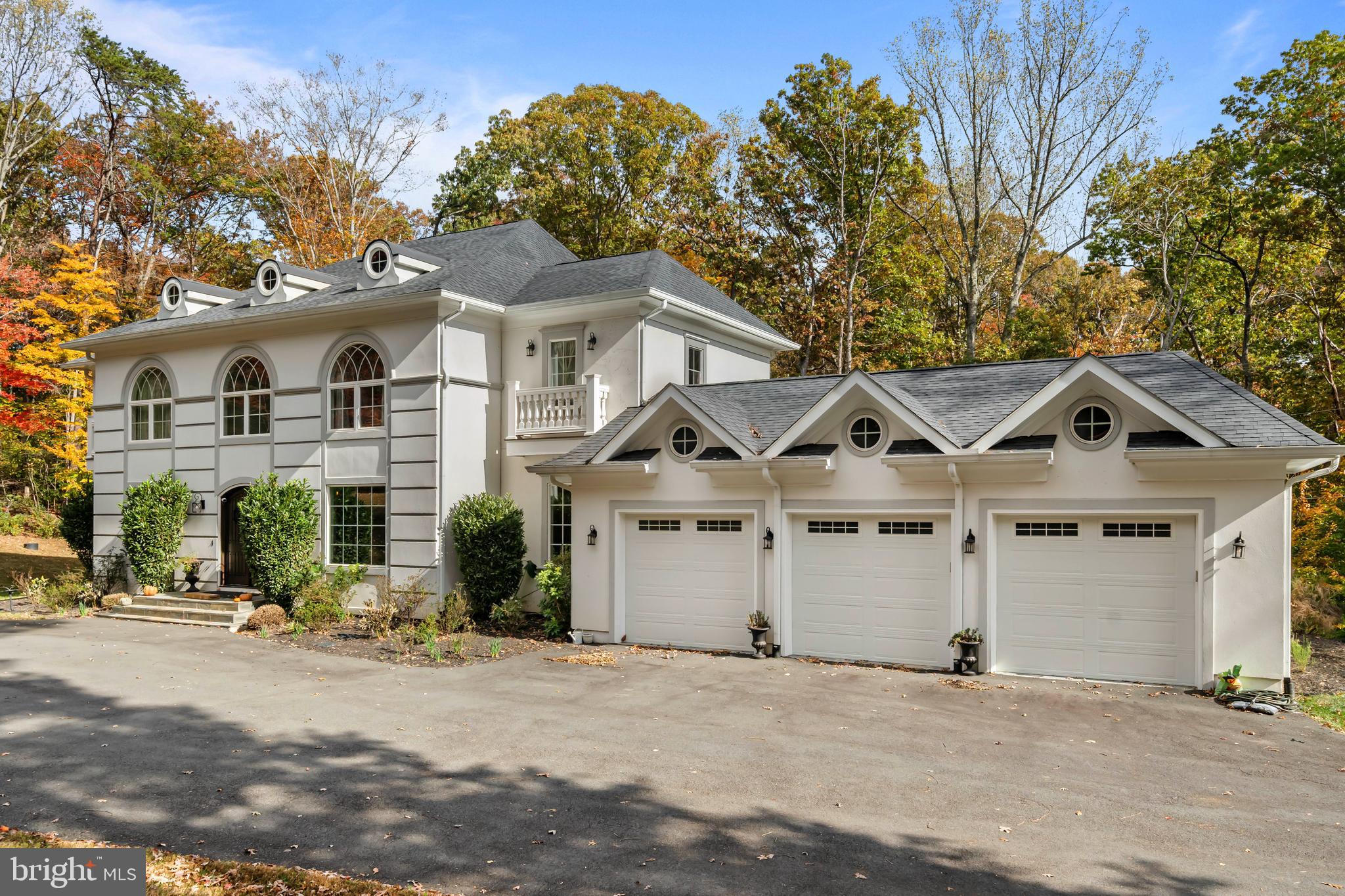 13025 Yates Ford Road Clifton, VA 20124 - Photo 3 of 82 a front view of a house with a garden