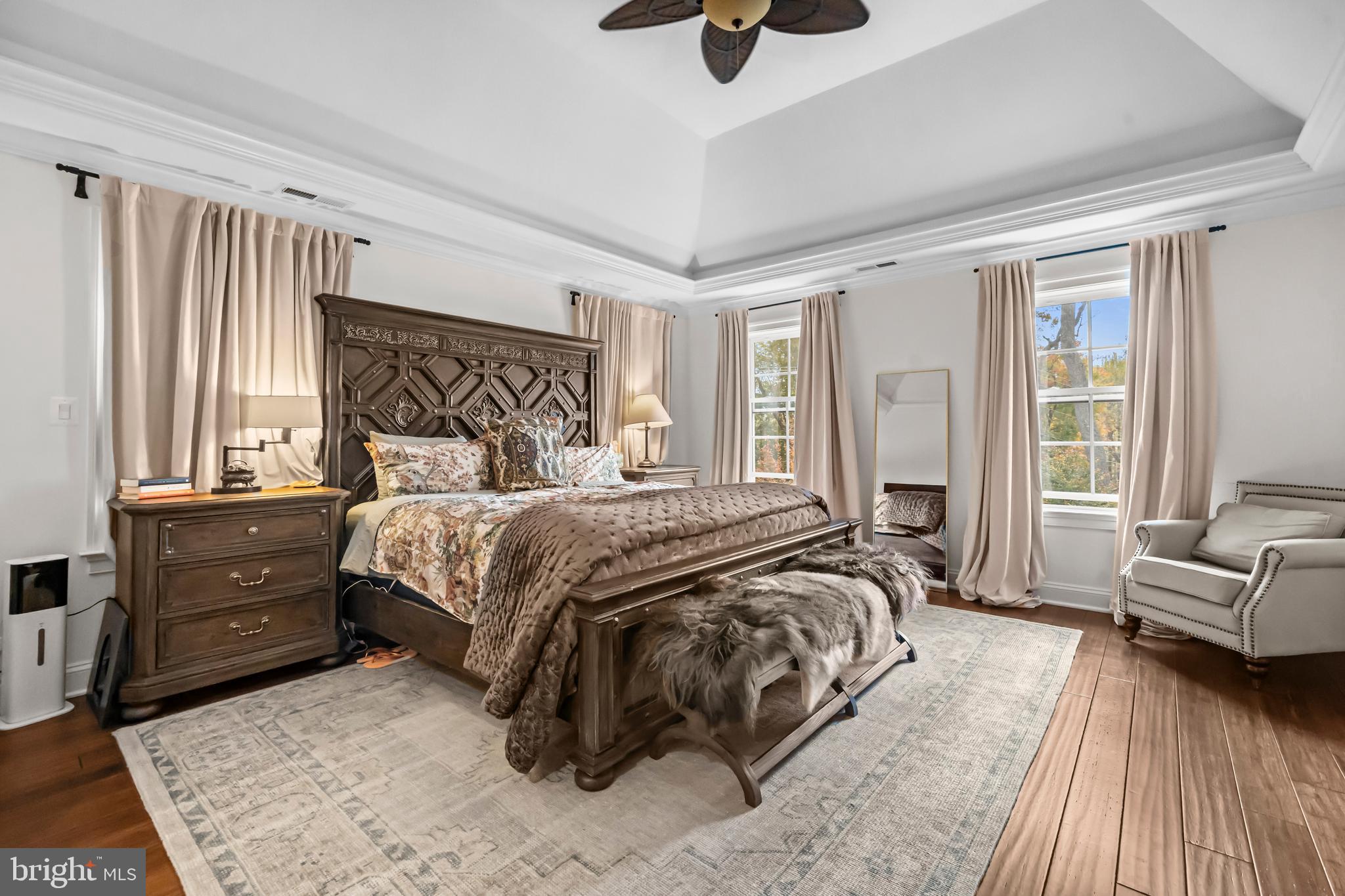 13025 Yates Ford Road Clifton, VA 20124 - Photo 32 of 82 a bedroom with a bed and glass windows