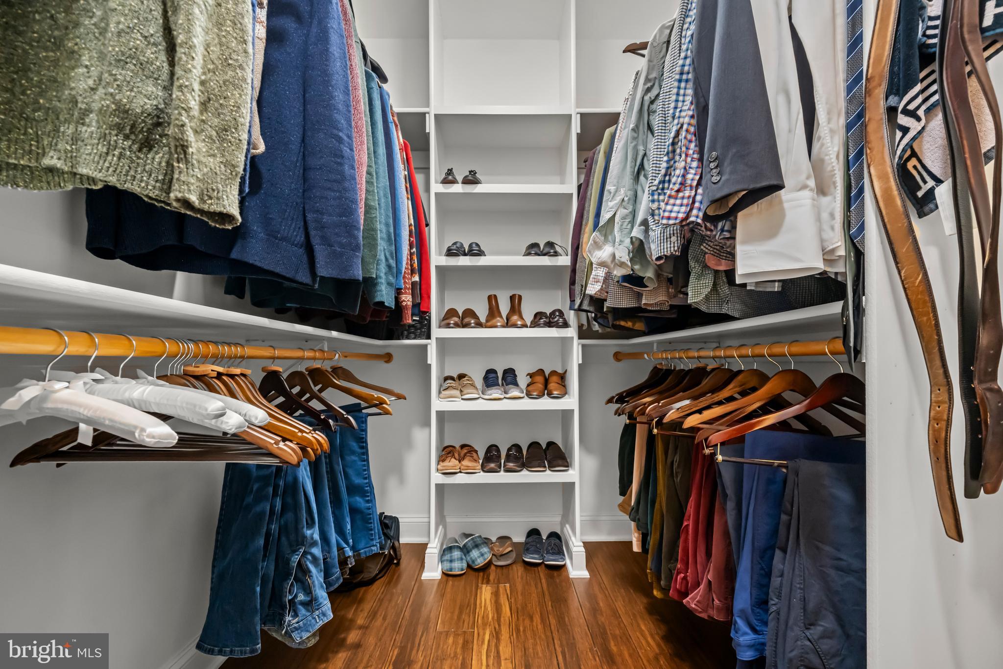 13025 Yates Ford Road Clifton, VA 20124 - Photo 35 of 82 a view of walk in closet with clothes and shoes
