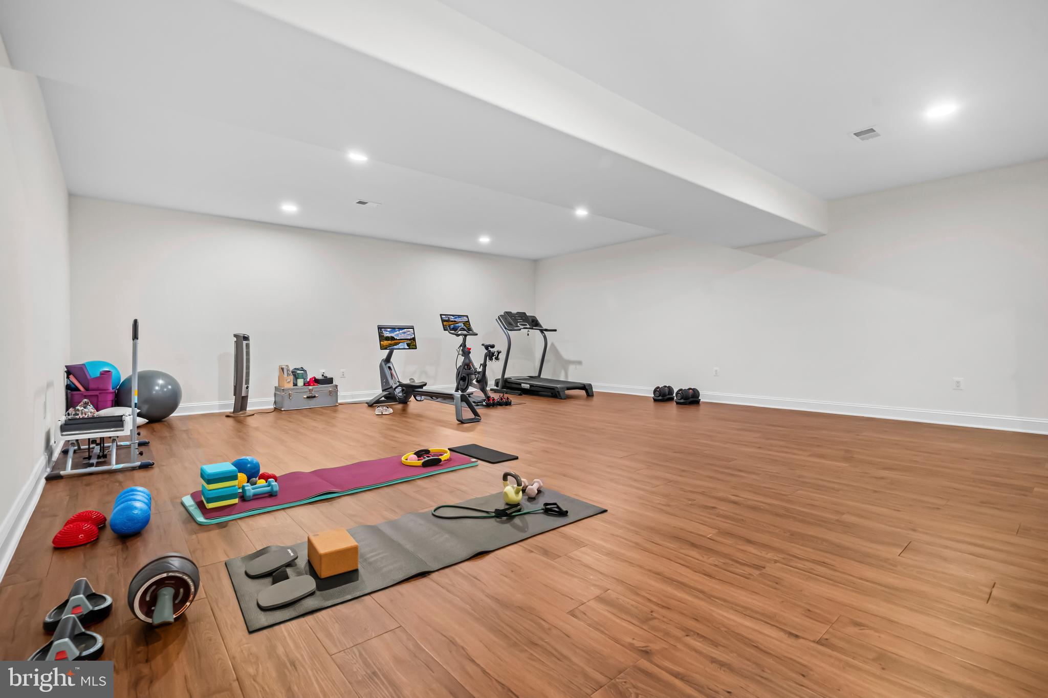 13025 Yates Ford Road Clifton, VA 20124 - Photo 53 of 82 a room with furniture and a wooden floor