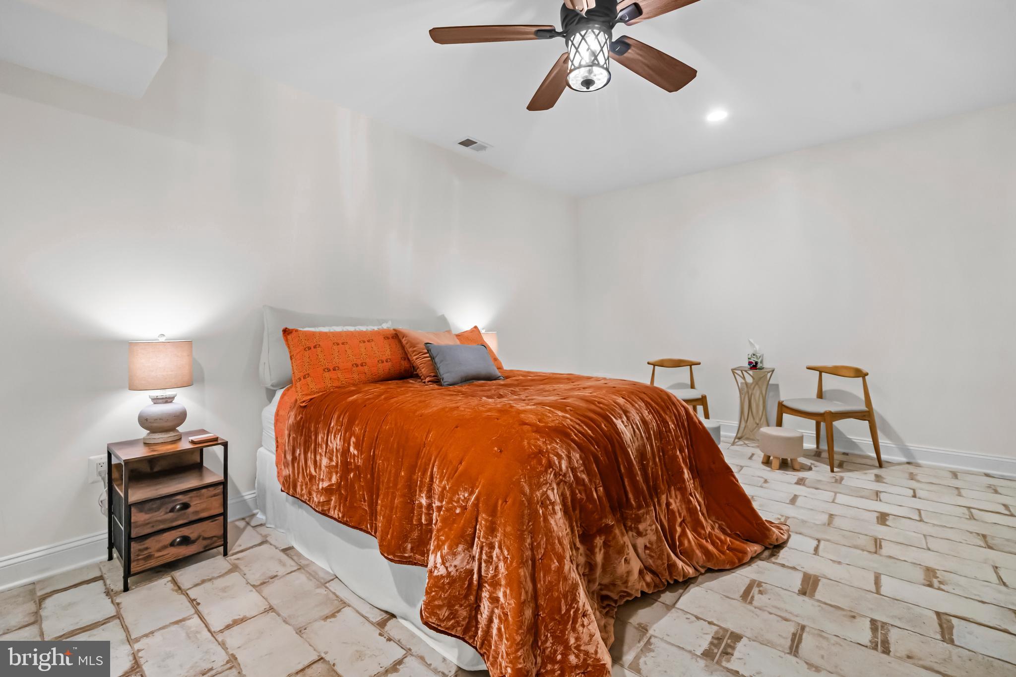 13025 Yates Ford Road Clifton, VA 20124 - Photo 54 of 82 a bedroom with a bed and chair