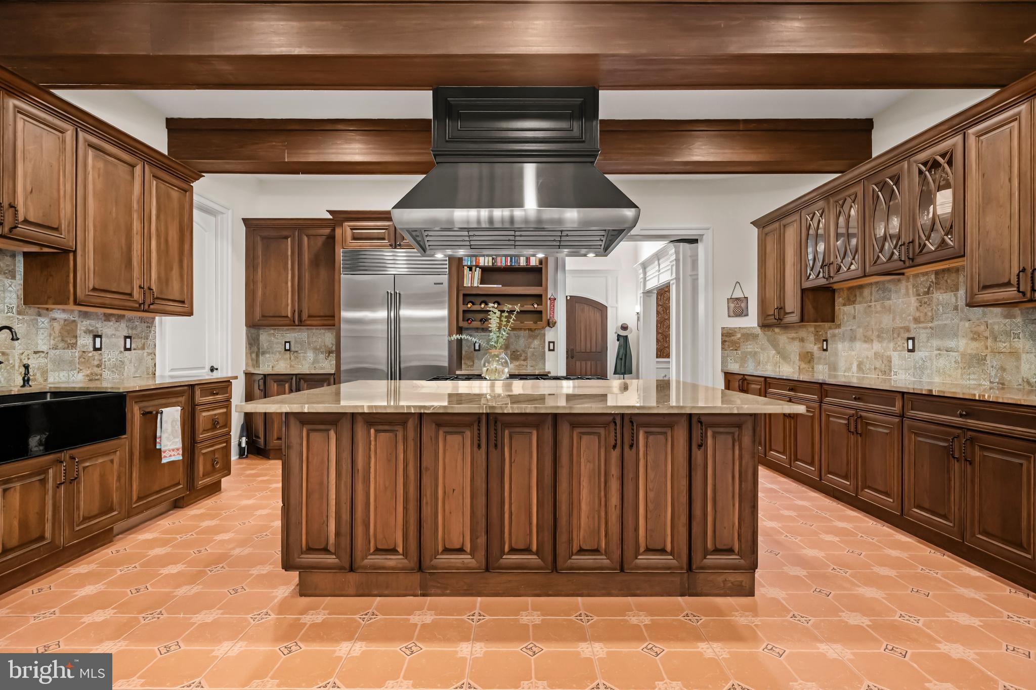 13025 Yates Ford Road Clifton, VA 20124 - Photo 10 of 82 a kitchen with stainless steel appliances granite countertop a stove a sink and a microwave