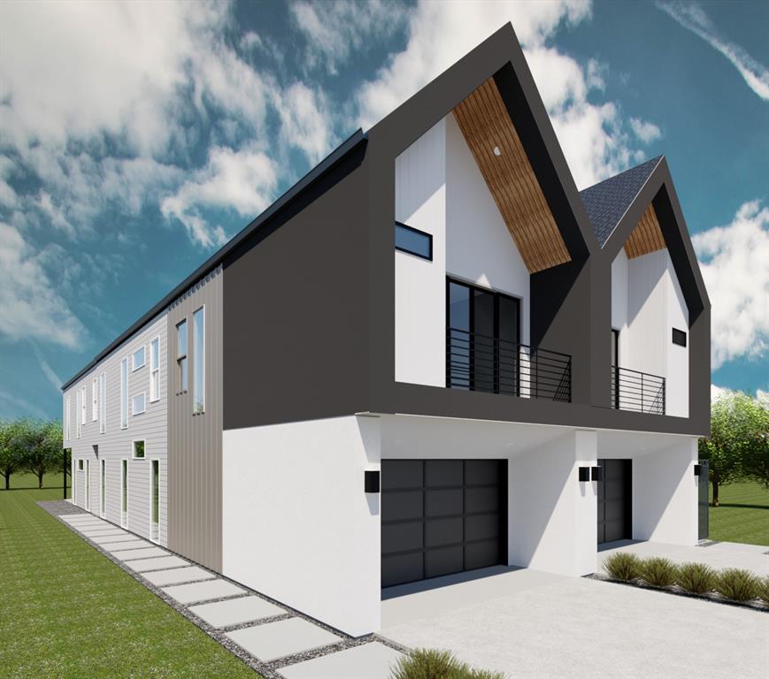 5809 Hudson Street Dallas, TX 75206 - Photo 2 of 4 a front view of a house with a yard