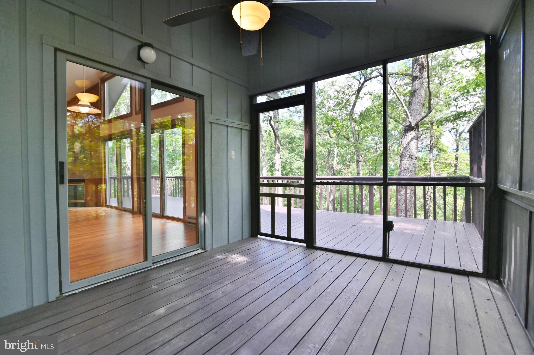 277 Anderson Road Basye, VA 22842 - Photo 48 of 57 Screened door to back main level deck