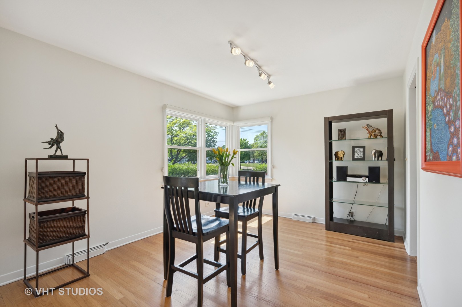 577 Ridge Road Highland Park, IL 60035 - Photo 3 of 20 a view of a dining room with furniture window and wooden floor