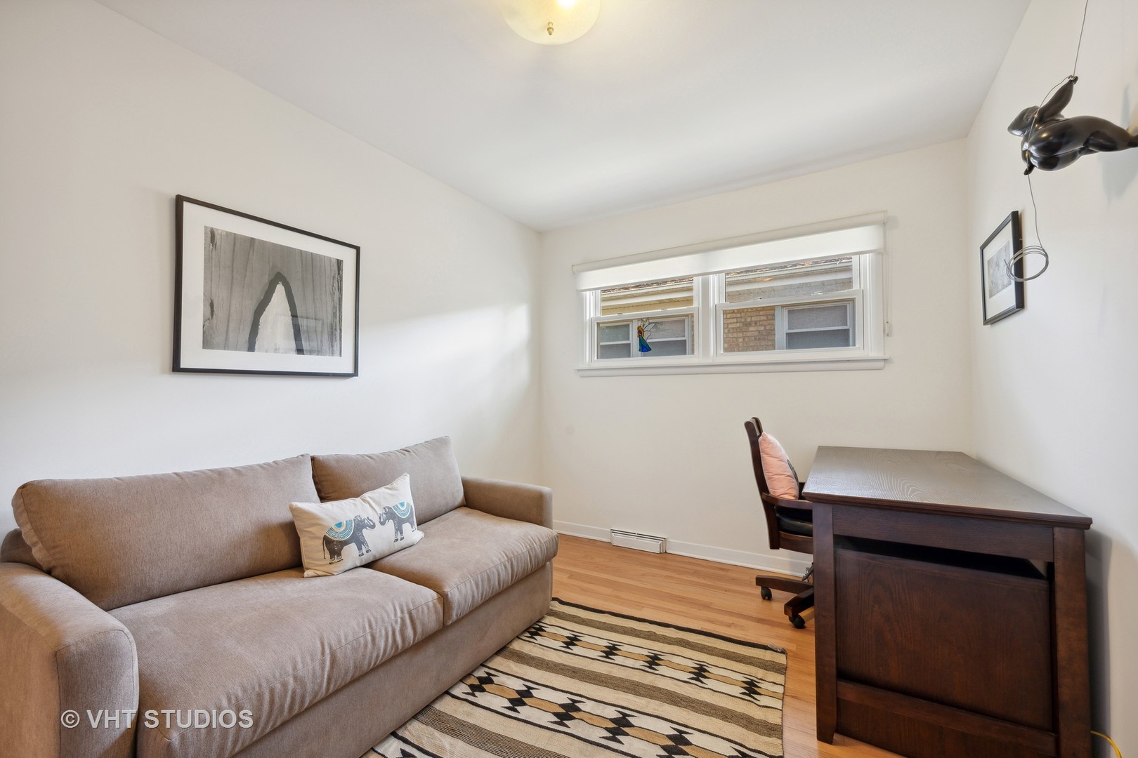 577 Ridge Road Highland Park, IL 60035 - Photo 8 of 20 a bedroom with furniture and wooden floor