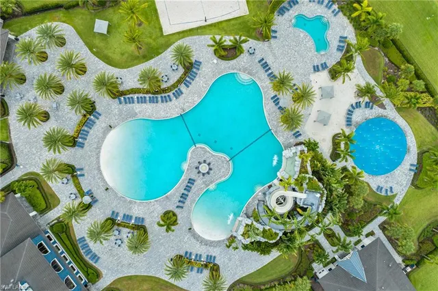 a view of a swimming pool with a garden