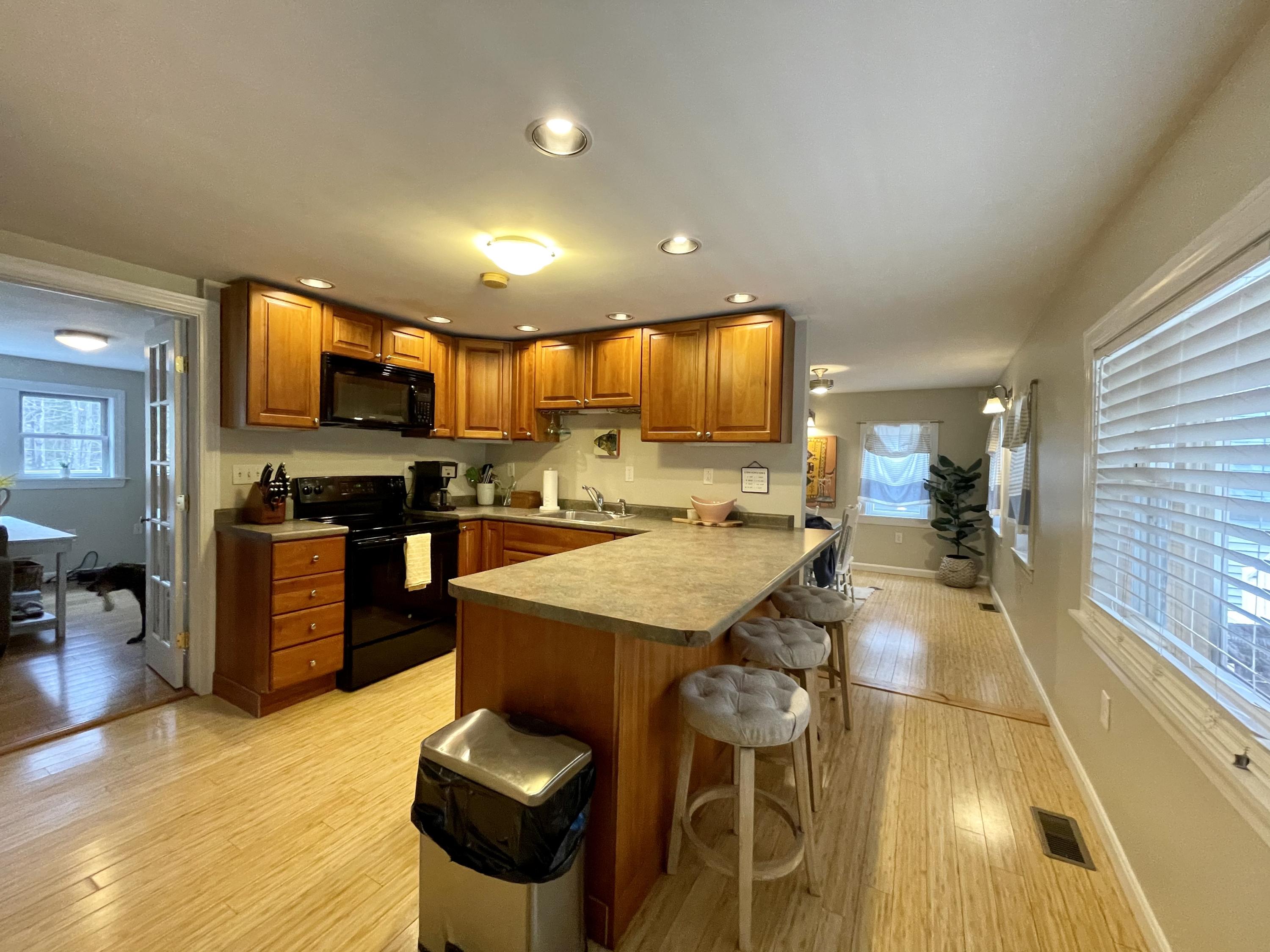 58 Meadow Road Hampden, ME 04444 - Photo 4 of 16 Enter the kitchen with bright sunshine