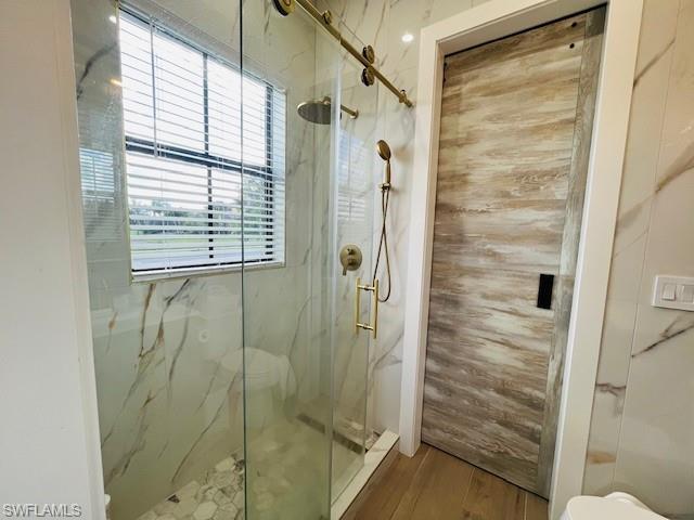 4795 Rosetta Terrace Immokalee, FL 34142 - Photo 15 of 27 Full bathroom with toilet and a marble finish shower