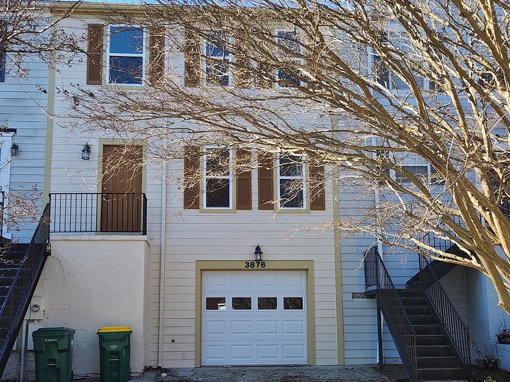 3876 Meadow Creek Drive, Unit 3876 Peachtree Corners, GA 30092 - Photo 1 of 39 a front view of a building