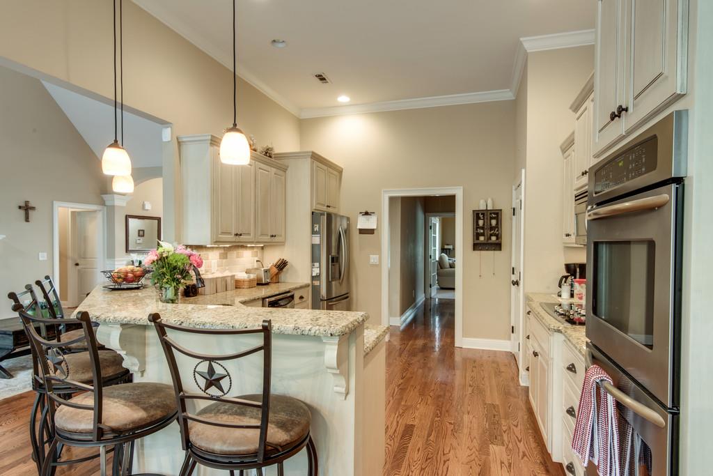 7302 Allans Ridge Lane Fairview, TN 37062 - Photo 12 of 30 a view of a kitchen and dining room
