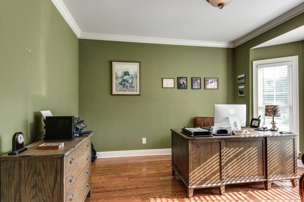 7302 Allans Ridge Lane Fairview, TN 37062 - Photo 17 of 30 a living room with a couch and a flat screen tv