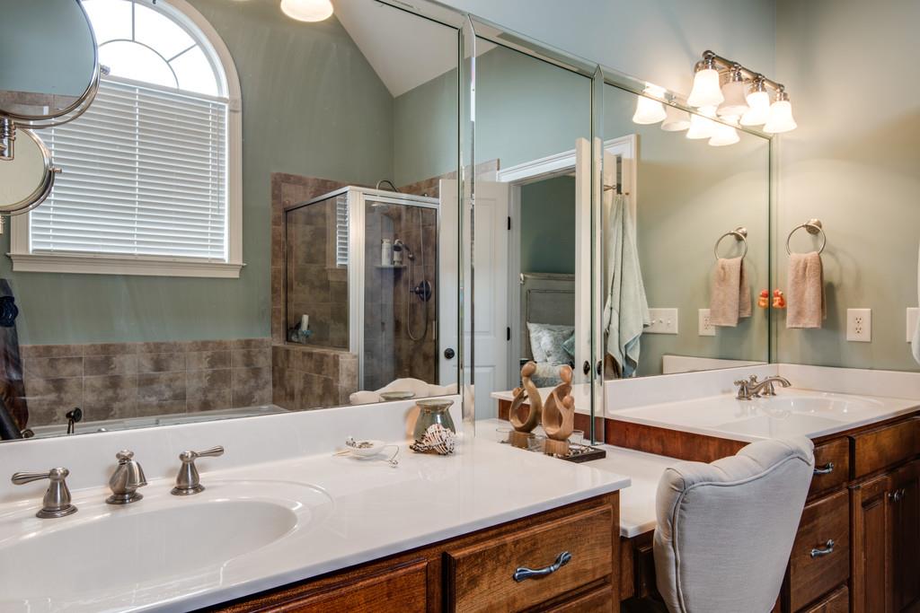 7302 Allans Ridge Lane Fairview, TN 37062 - Photo 21 of 30 a bathroom with a sink and a mirror