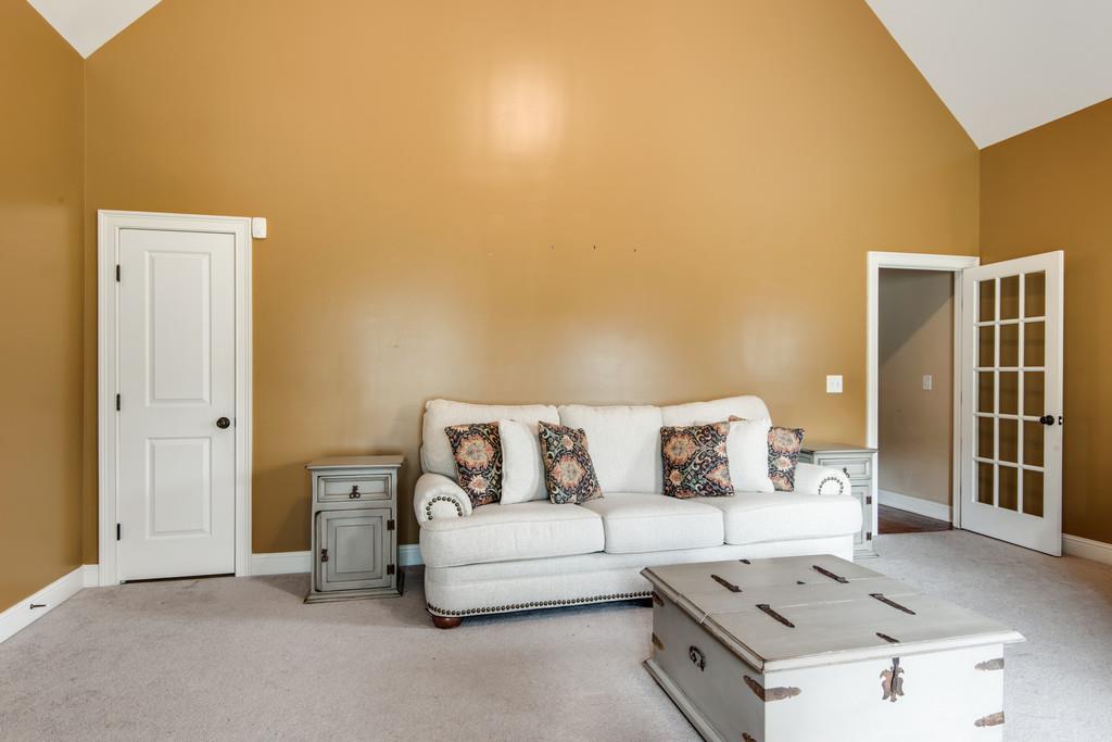 7302 Allans Ridge Lane Fairview, TN 37062 - Photo 23 of 30 a living room with furniture and a table