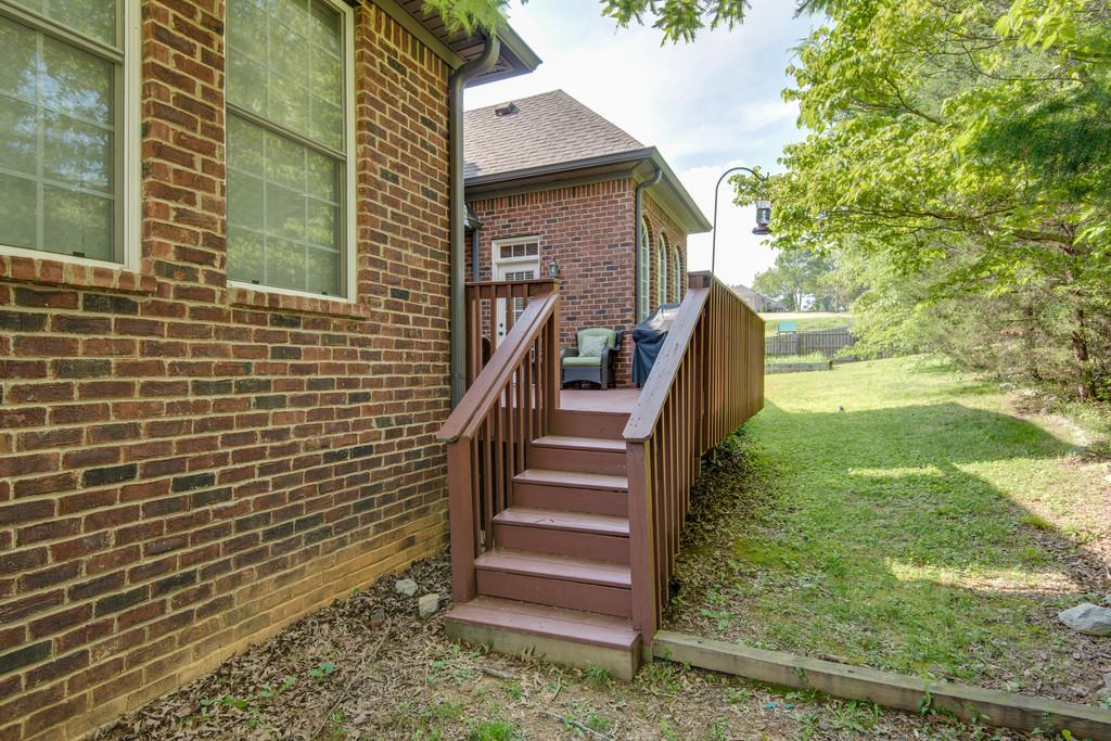 7302 Allans Ridge Lane Fairview, TN 37062 - Photo 30 of 30 a view of a backyard with stairs