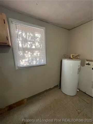 a view of a room that has a window