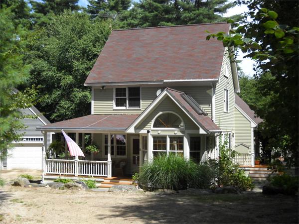71 Torrey Road Sutton, MA 01590 - Photo 1 of 1 a front view of a house with a yard