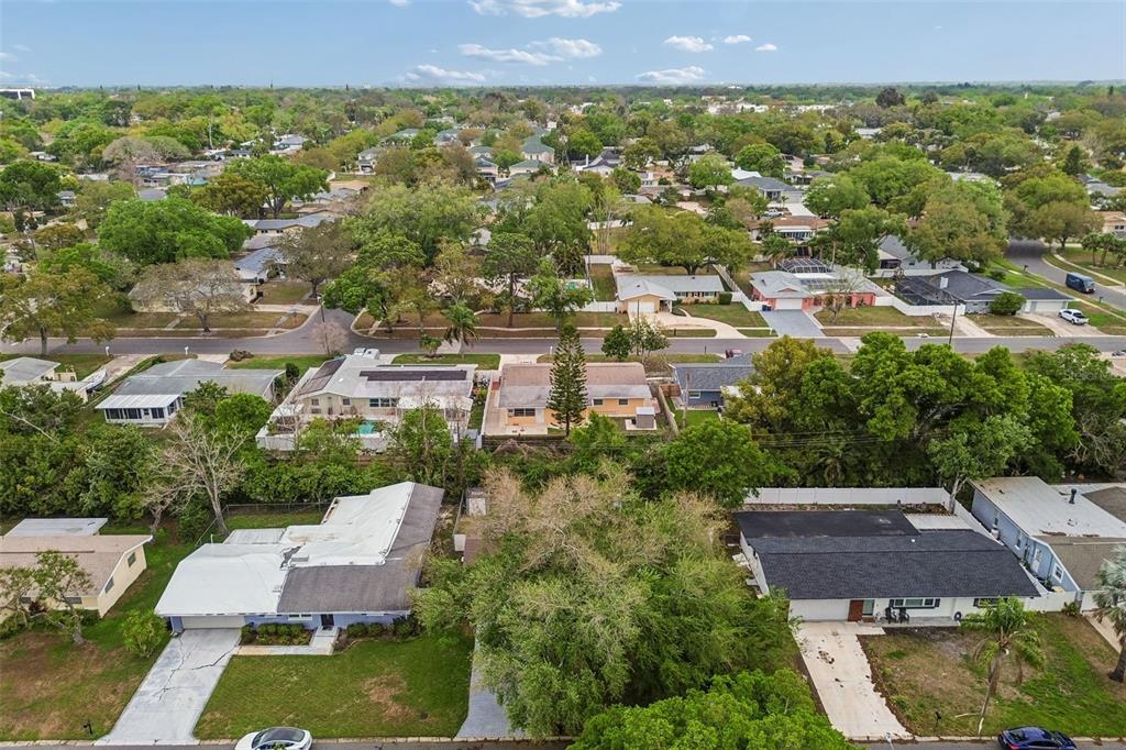 1618 Barry Road Clearwater, FL 33756 - Photo 61 of 71 an aerial view of residential houses with outdoor space