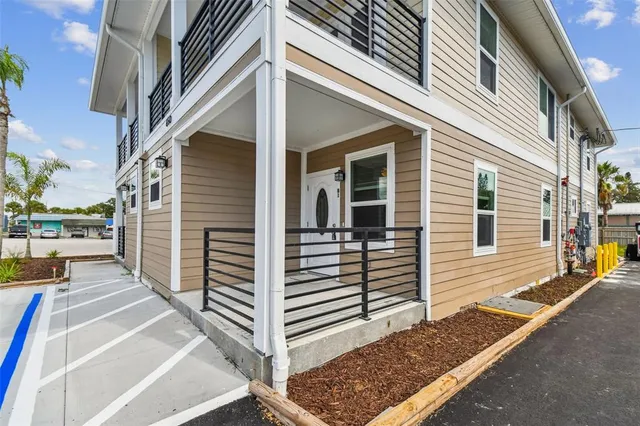 a view of a house with a street