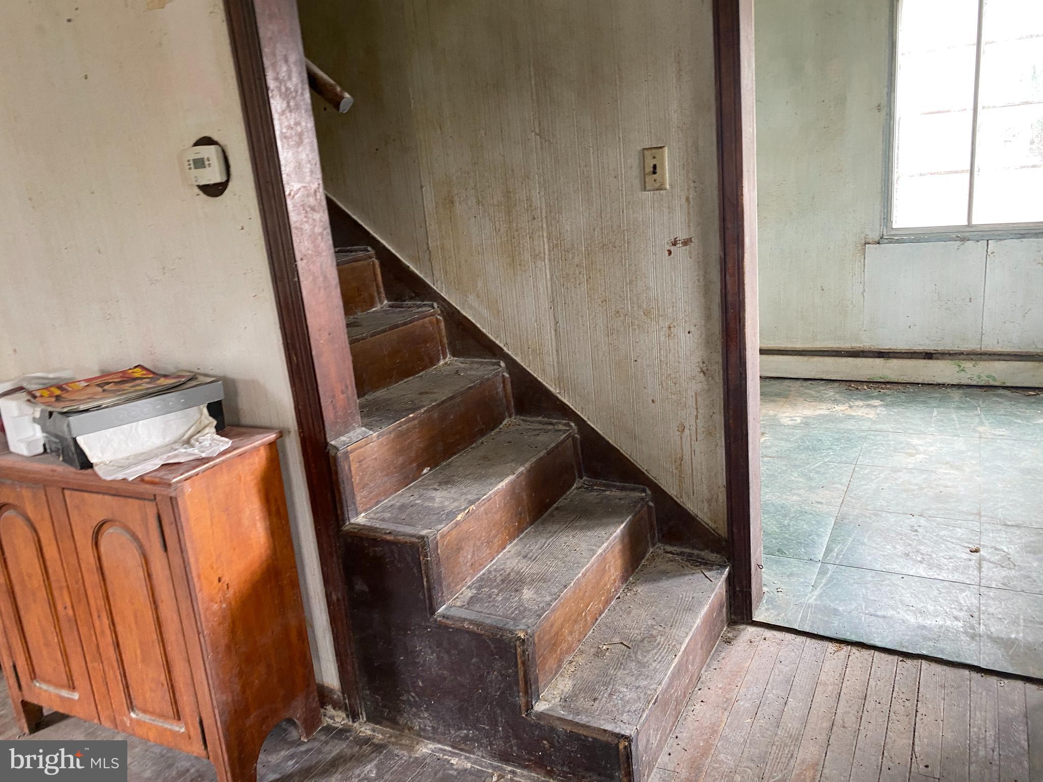 8226 Beach Road Curtis Bay, MD 21226 - Photo 9 of 23 Living Room stairs