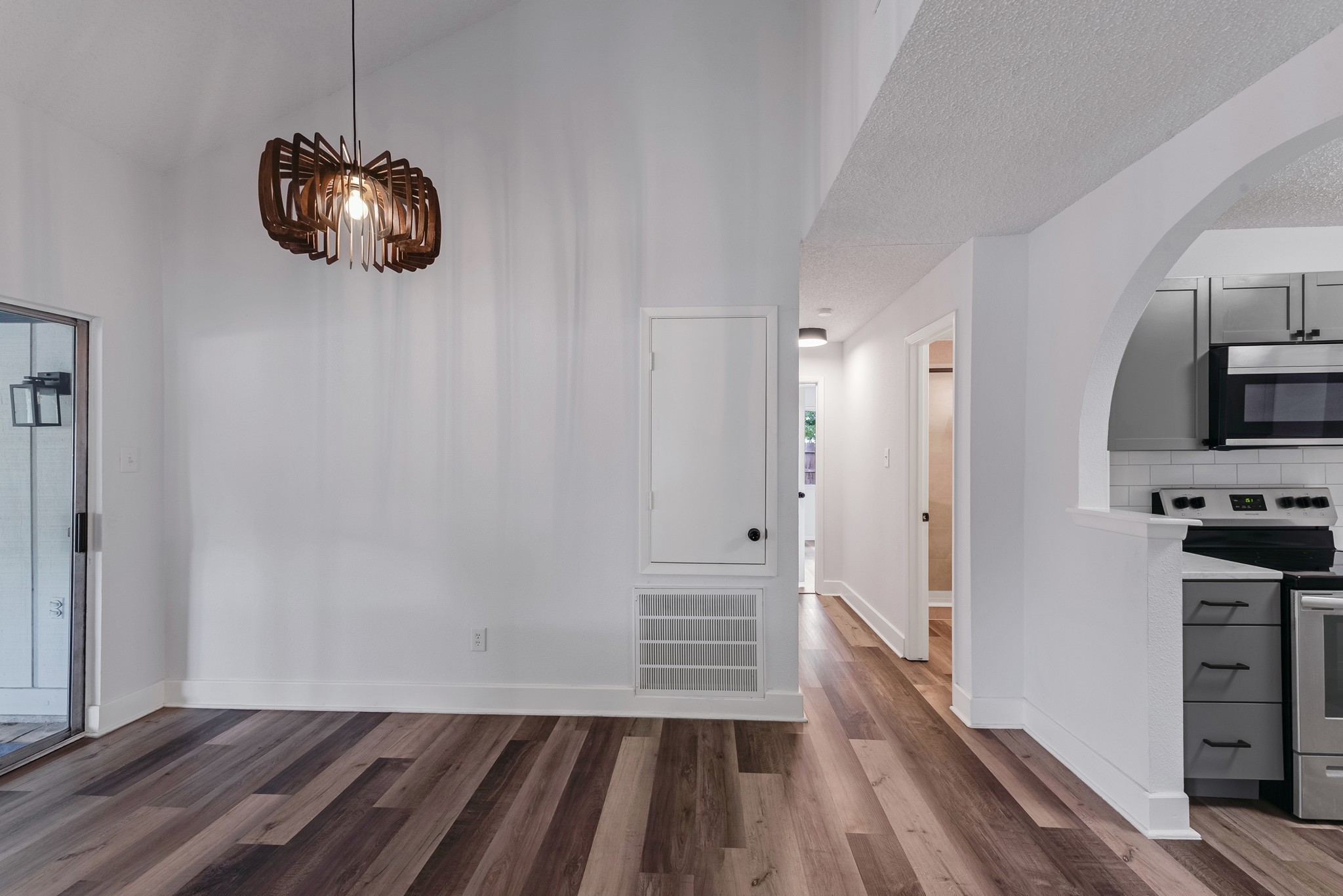 23426 Prairie Bird Drive Spring, TX 77373 - Photo 17 of 34 a view of a room with wooden floor and a sink