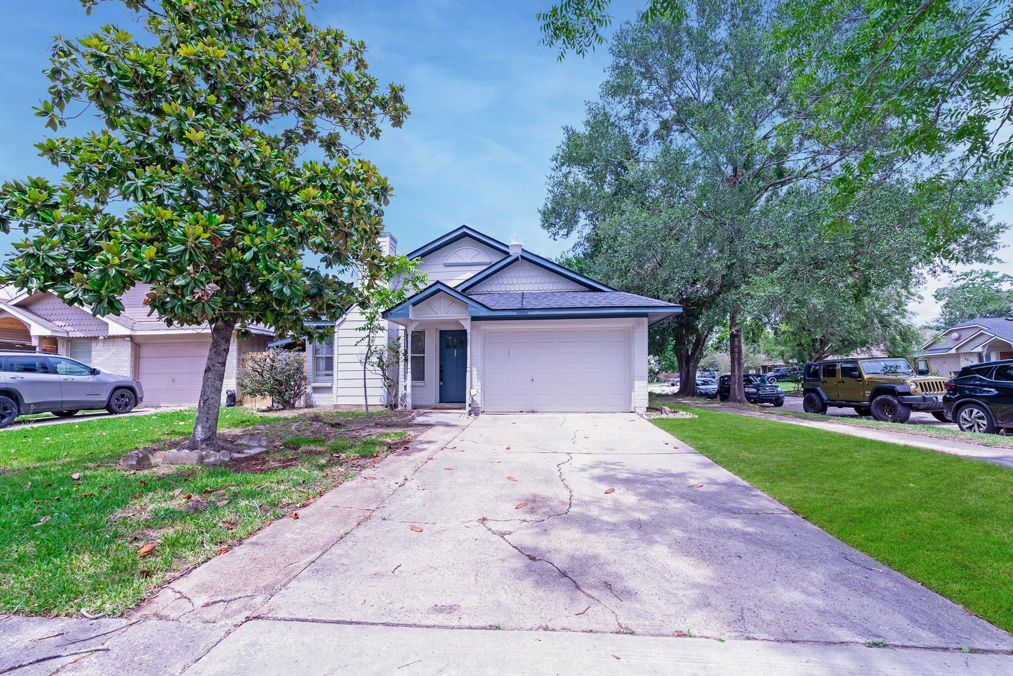 23426 Prairie Bird Drive Spring, TX 77373 - Photo 33 of 34 a front view of a house with a yard and garage