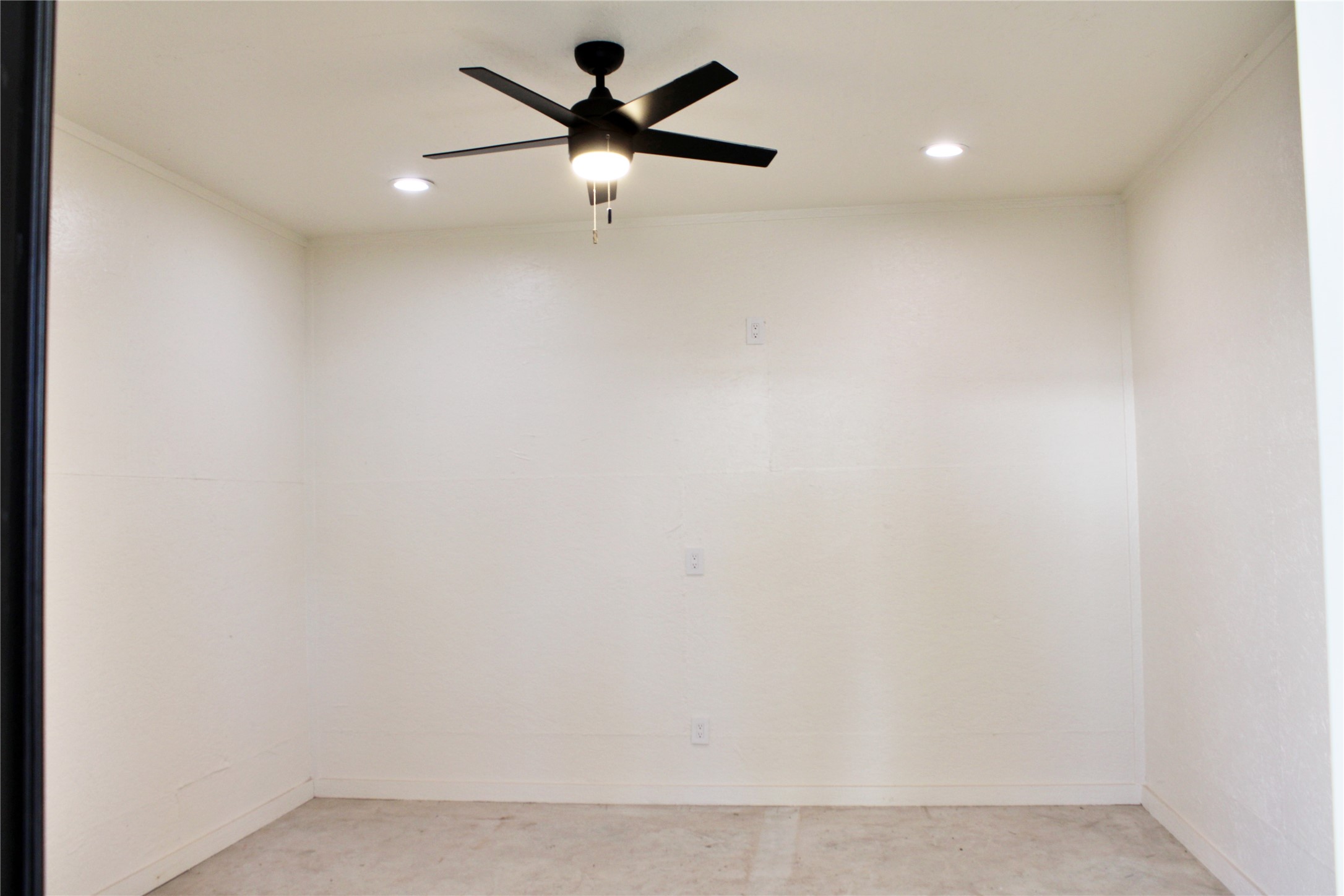 678 Colorado Street Glidden, TX 78943 - Photo 48 of 48 an empty room with a ceiling fan and a window