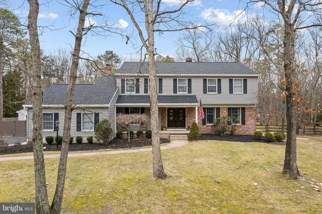 a front view of a house with swimming pool