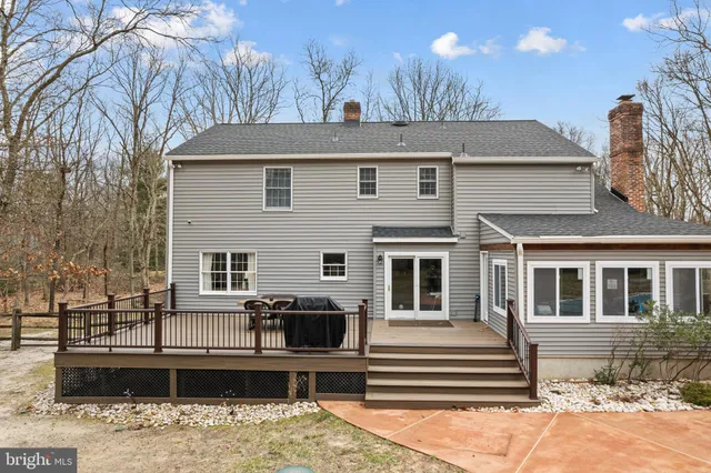 a view of a patio with a yard