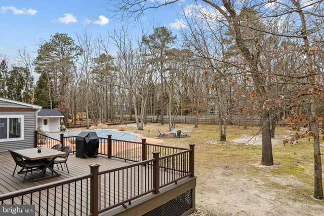 a view of a yard with trees