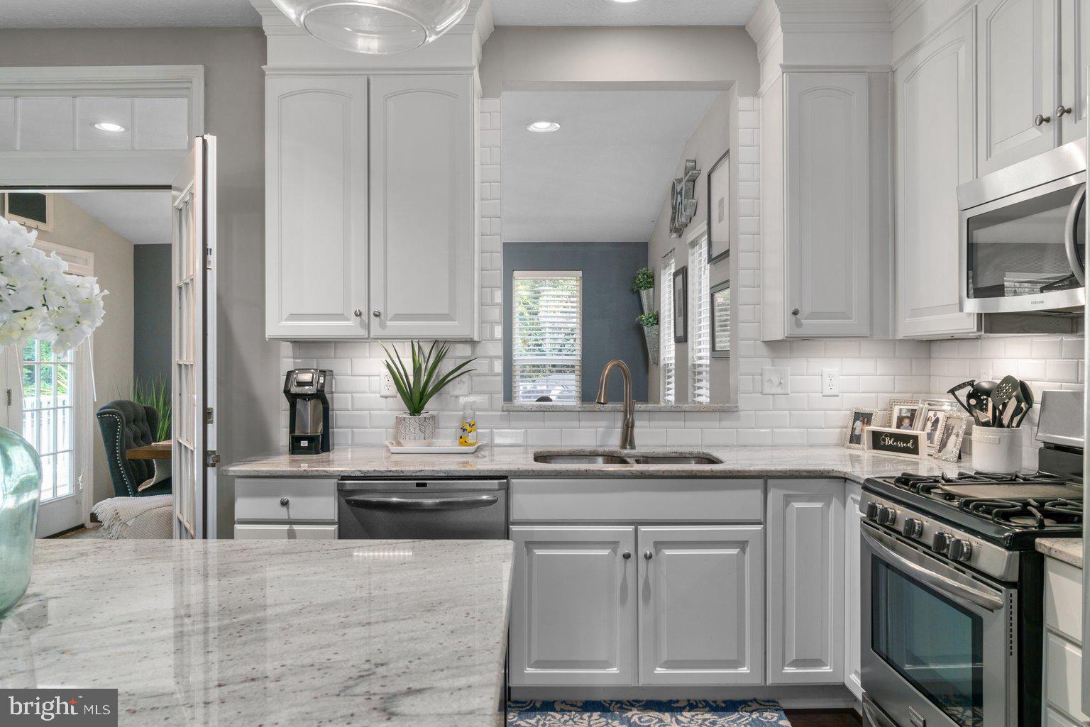 330 Spry Island Road Joppa, MD 21085 - Photo 14 of 61 Granite Countertops & White Subway Tile Backsplash