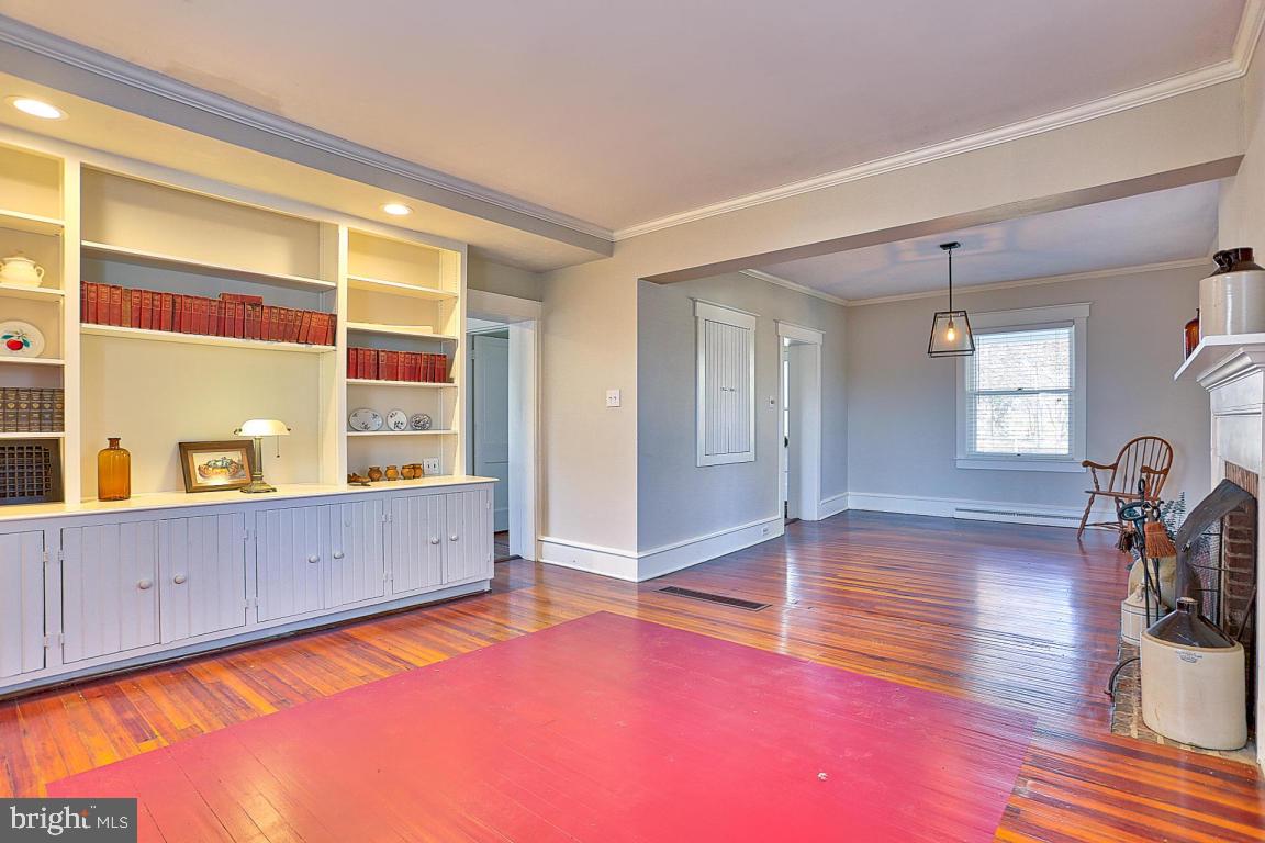 181 Windover Turn Lancaster, PA 17601 - Photo 11 of 58 a view of empty room with wooden floor and fan