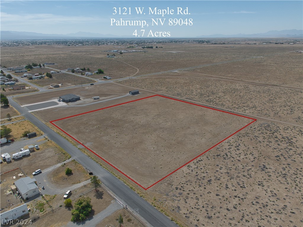 3121 Maple Road Pahrump, NV 89048 - Photo 1 of 13 Red property lines are estimated. A survey should