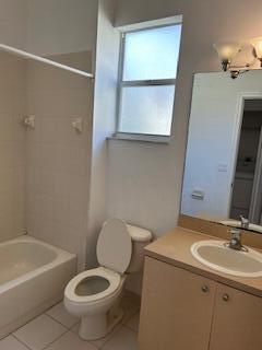 5642 Sunberry Circle Fort Pierce, FL 34951 - Photo 8 of 11 a bathroom with a sink toilet and shower