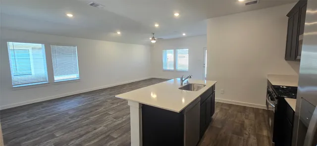a bathroom with a sink a vanity and mirror