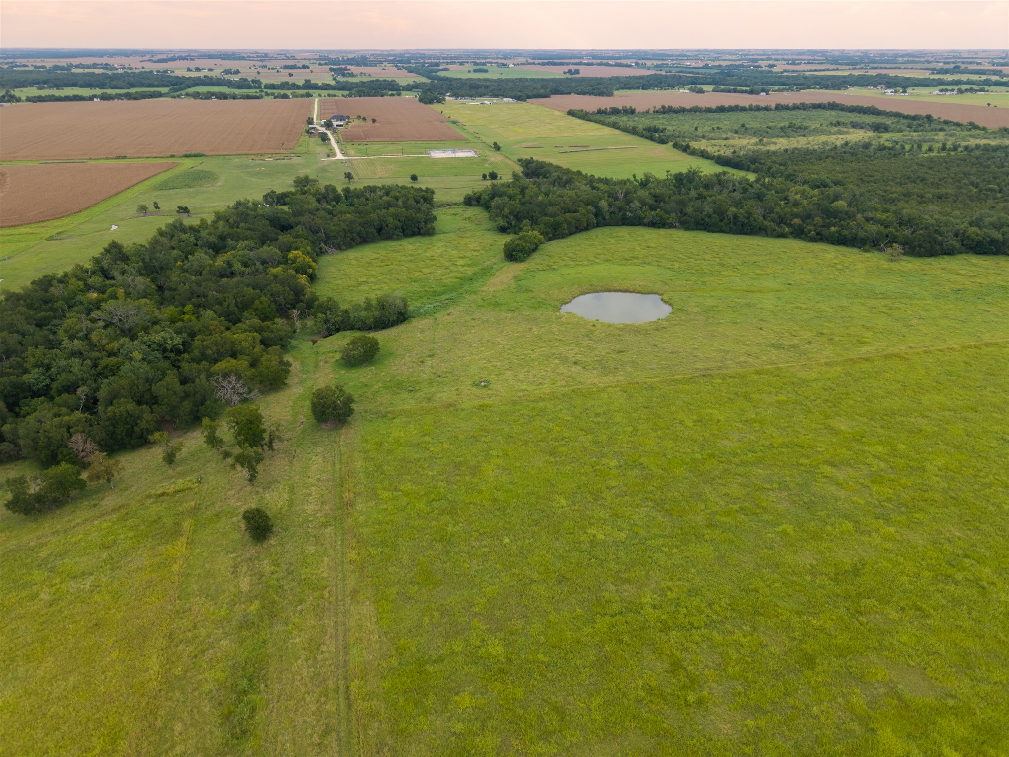 10966 Stringtown Road Temple, TX 76501 - Photo 5 of 24 a view of a lake with a big yard