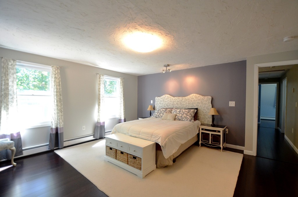 335 Littleton Road Harvard, MA 01451 - Photo 11 of 24 a bedroom with a bed and a window