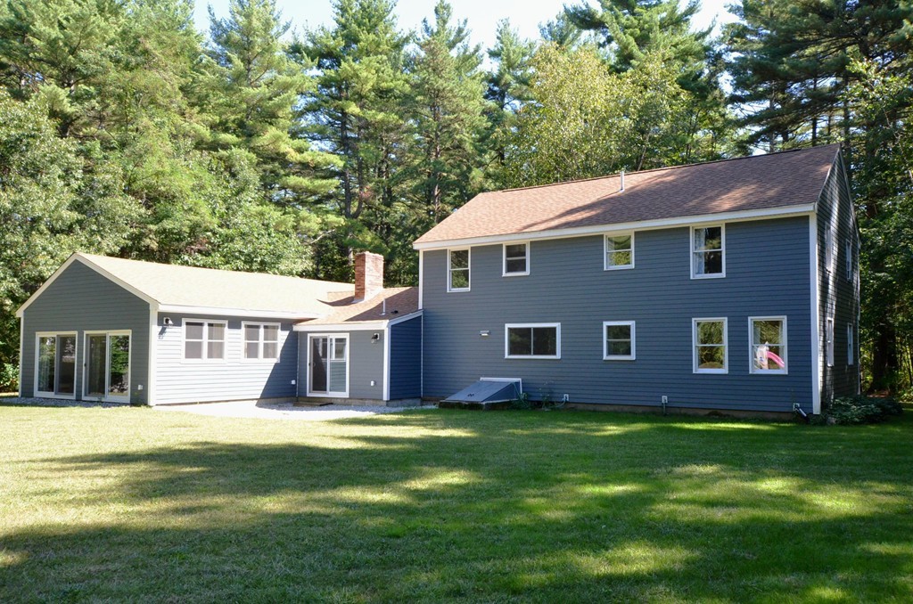 335 Littleton Road Harvard, MA 01451 - Photo 23 of 24 a front view of a house with garden